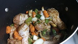 This is the chicken seasoning with the green seasoning before I cook it